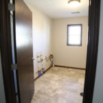 Laundry and mechanical space in 3 bedroom home for sale