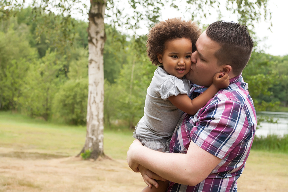 Black father with his daughter having a nice time