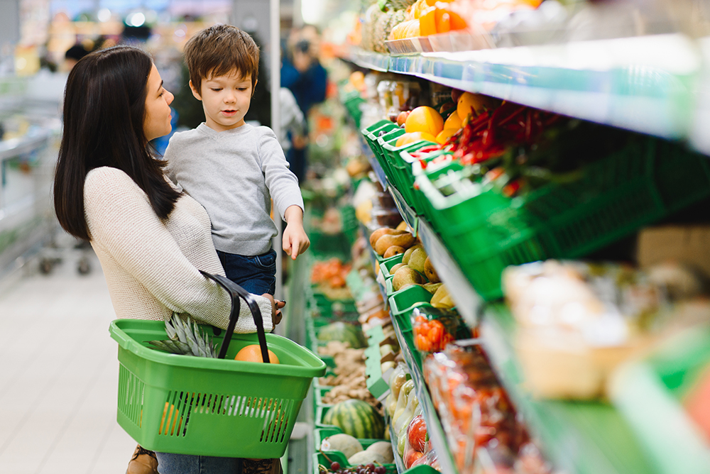 Mother with son at a grocery store